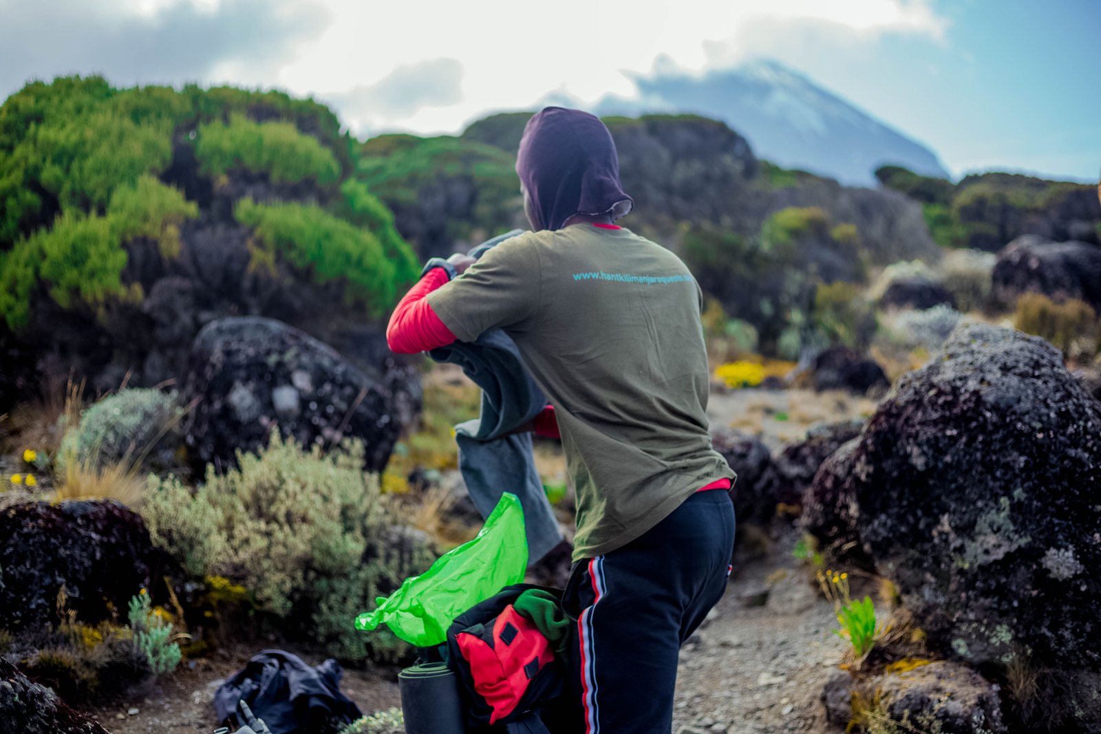 Hiker wearing well-broken-in waterproof boots